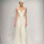 white sleevless wedding gown by Watters