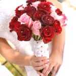 red and pink ros Bouquets from Real Weddings