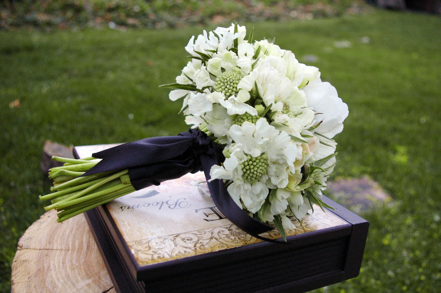 white bridal bouquet white green black bouquet