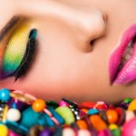 Woman face colourful make-up lips