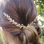 golden and white color wedding headpiece