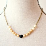 skin and black color Swarovski Strand Necklace