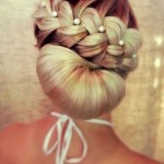 Haute Bridal Updo Hairstyle with Pearl Embellishments Haute Bridal Updo Hairstyle with Pearl Embellishments