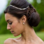 latest updo brides with the use of pearl;