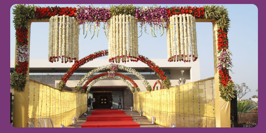 1 Indian outdoor wedding reception with flowers